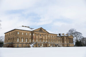 a large old building in the snow