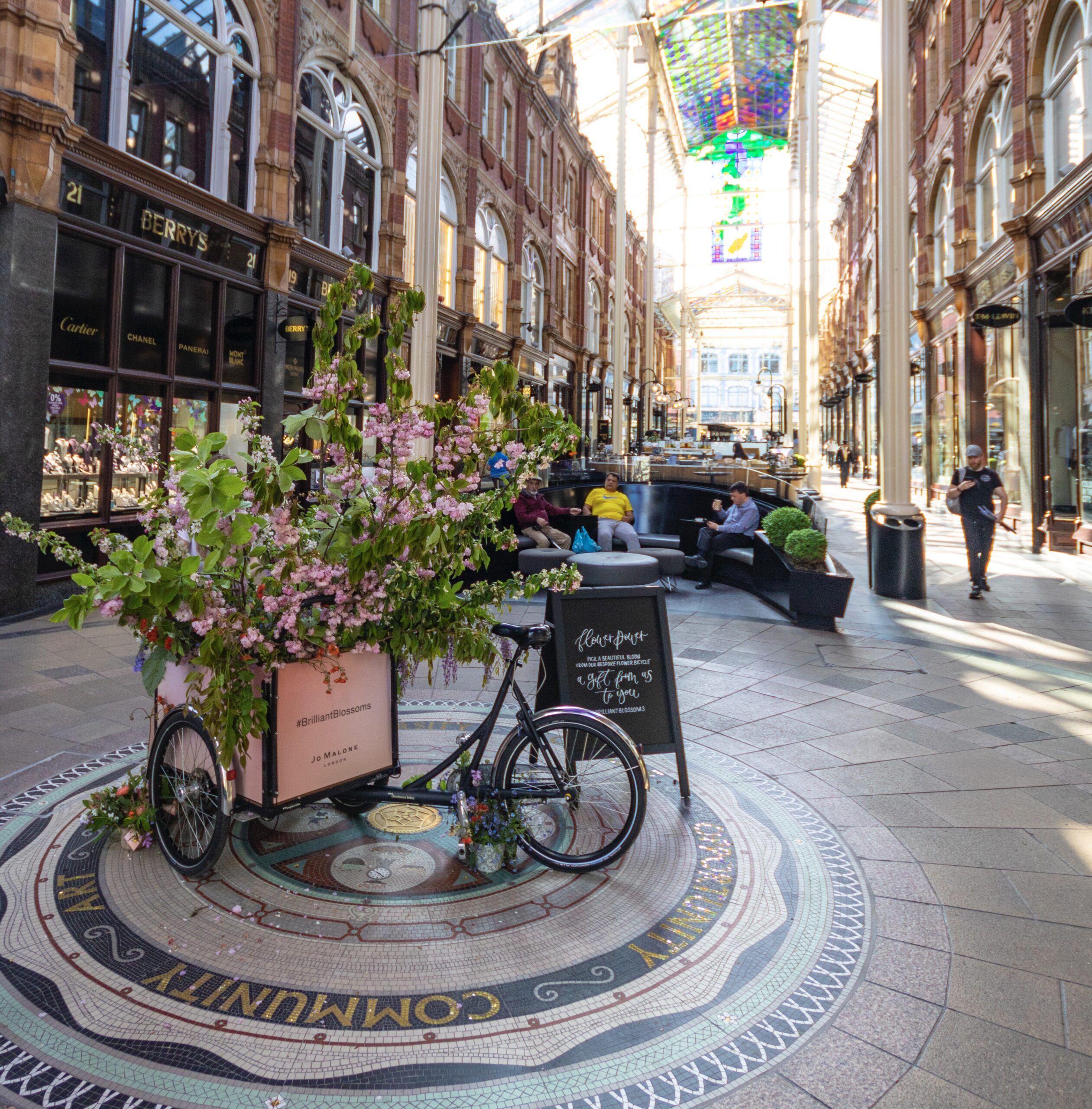 Photograph of Victoria Leeds County Arcade with bike in front.