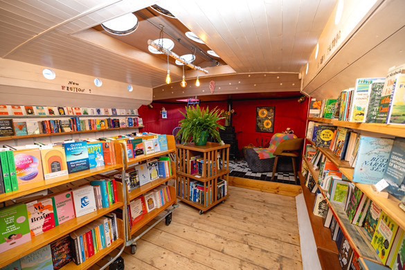a room filled with books on shelves