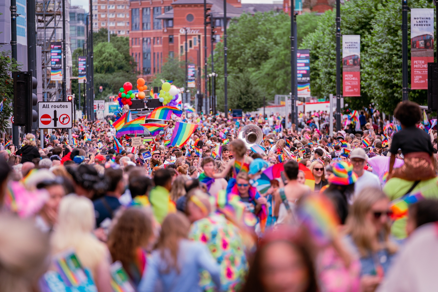Image of crowd celebrating at Leeds Pride parade.