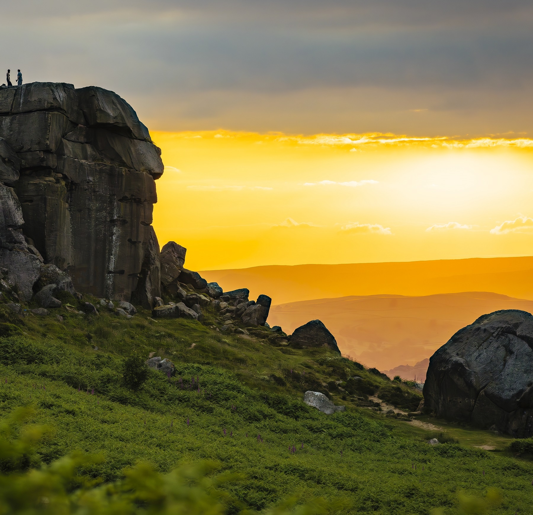 Stunning sunset overlooking Ilkely Moor from the iconic natural land mark 'Cow and Calf'