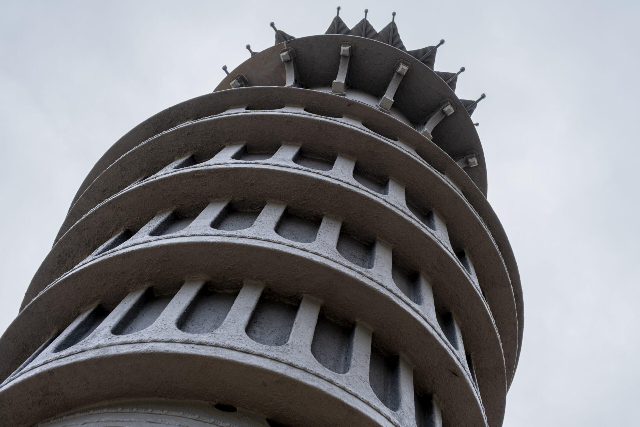 A close up photograph of Tower of Now, looking from beneath the scultpure to the top.