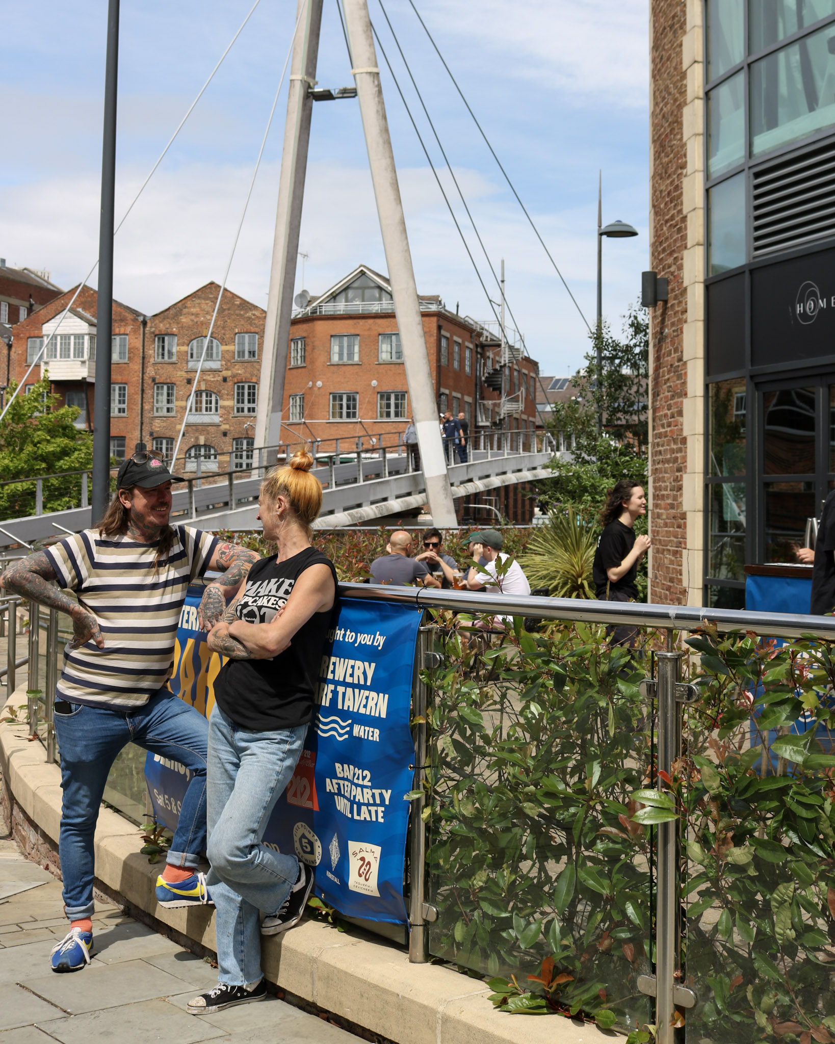 two people stood in front of a bridge