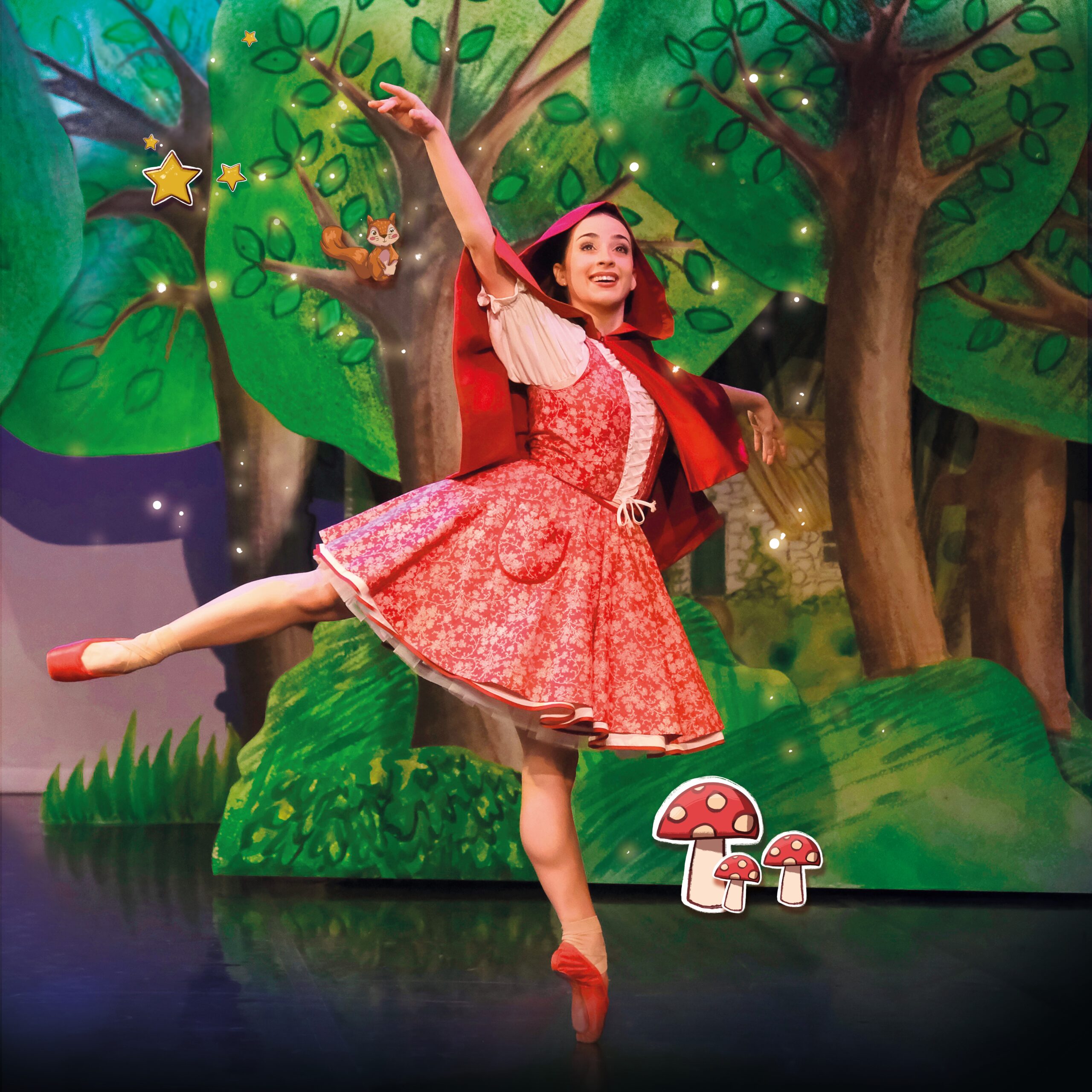 a ballerina in front of a forest background wearing a dress and red cloak