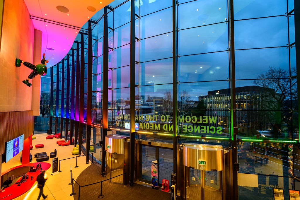 the facade of the media museum with large glass windows