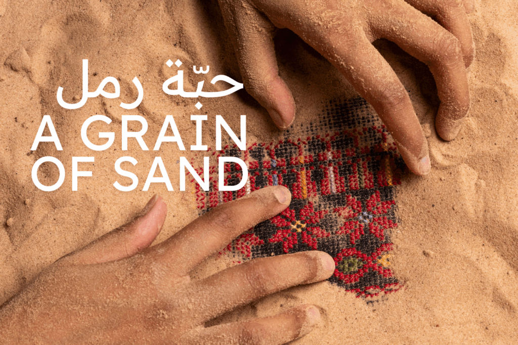 a poster for show a grain of sand
