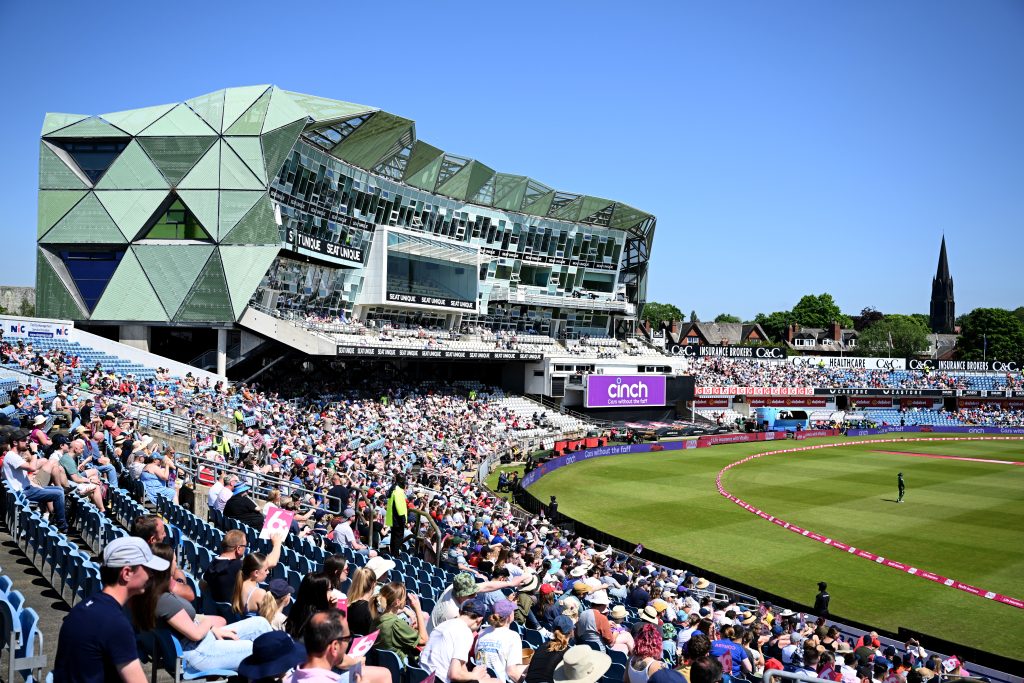 View of crowds at Headingley Stadium on circket day, blue skies sun is shining.