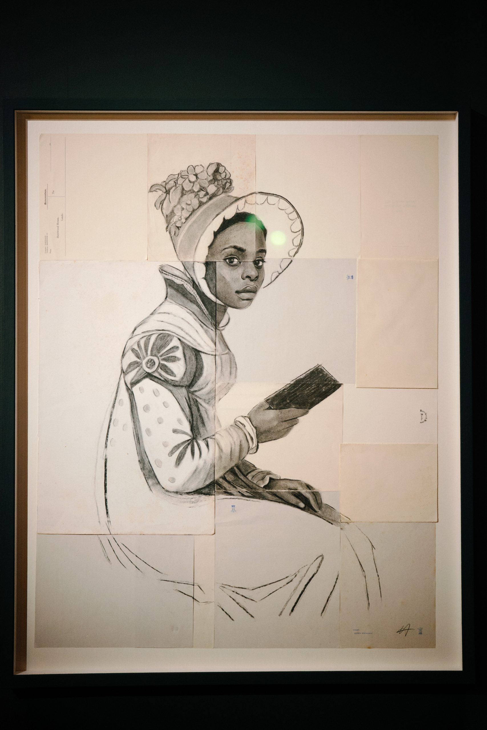 a photograph of an artwork - a black woman in regency dress and a bonnet reading a book