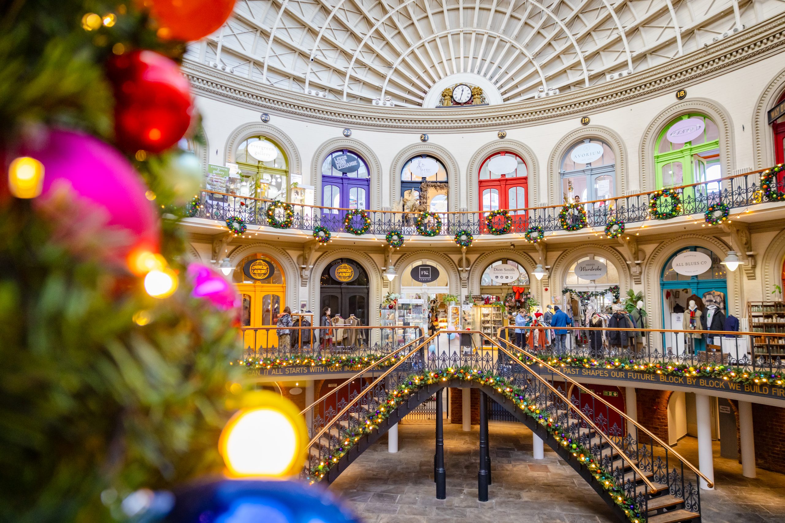 Interior view of Leeds Corn Exchange with christmas tree and lights in foreground